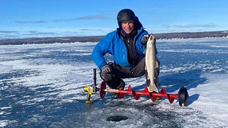 Julian Holenstein with lake trout 