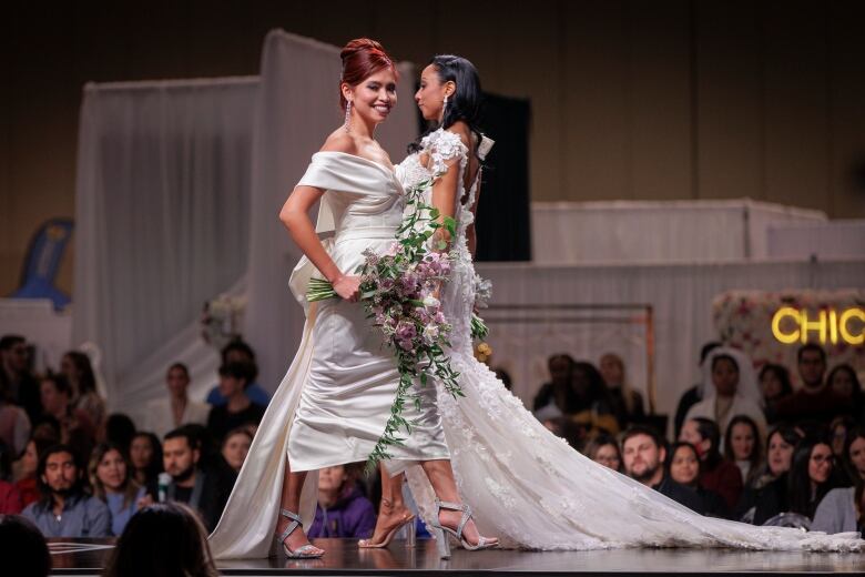 Models walk the runway during a wedding dress fashion show at Canadas Bridal Show, at the Metro Toronto Convention Centre, on Jan. 13, 2023.