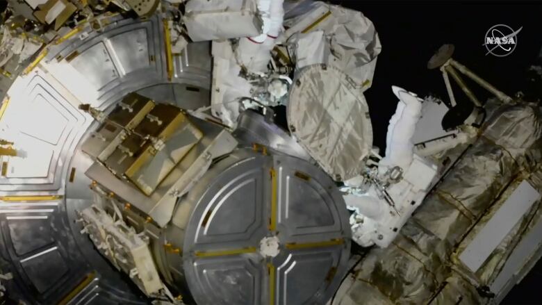 Astronauts Nicole Mann and Koichi Wakata venture out on a spacewalk at the International Space Station.