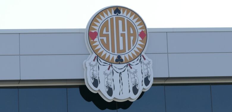 Logo for SIGA on the exterior of a building.