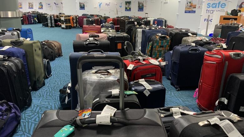 Unclaimed checked bags are shown at the Vancouver International Airport.