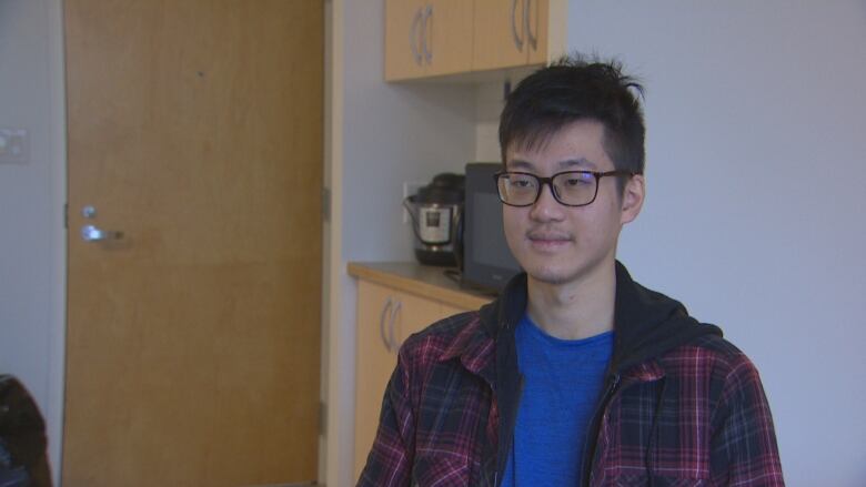 UBC student Kevin Hui is pictured. He is disappointed that rents at UBC residences are set to rise. 