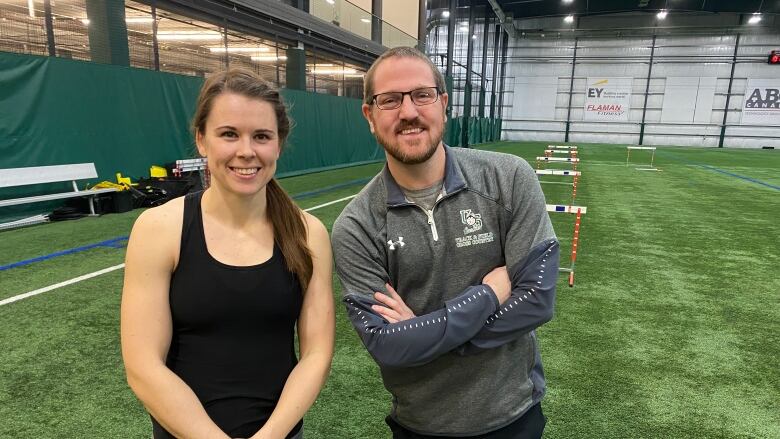 World class hurdler Michelle Harrison, left, with coach Jason Reindl, will compete against an international field in front of her home crowd this weekend at Saskatoon's historic Knights of Columbus Indoor Games.