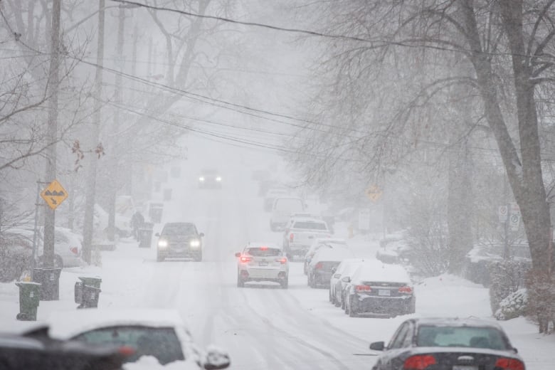 Toronto police urge drivers to slow down because of slippery roads on Jan. 25, 2023.