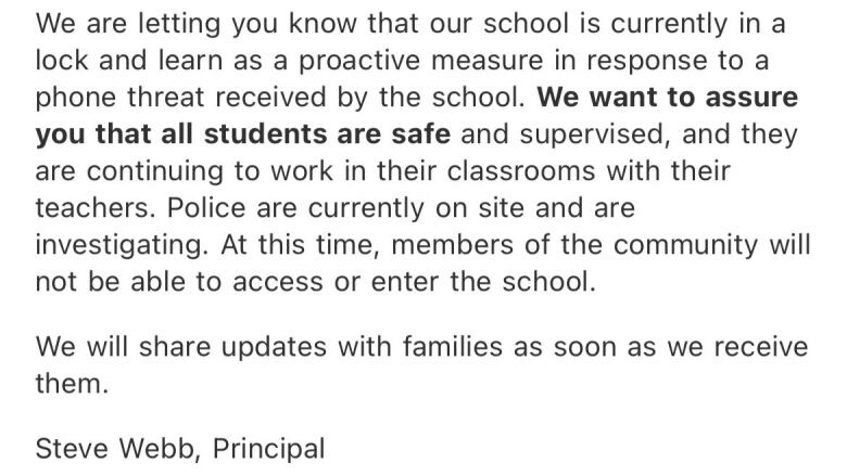 text of an email saying the students are safe and in a lock and learn situation.