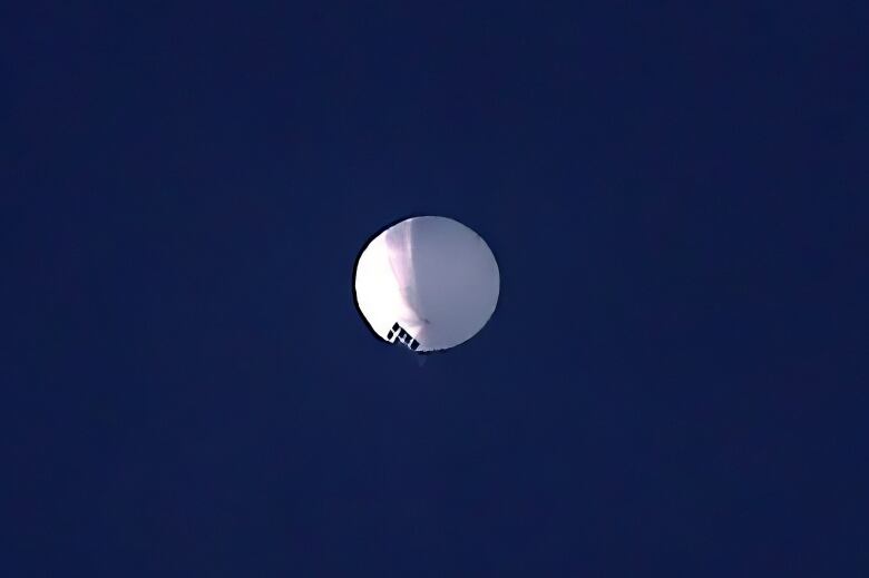 A balloon flies at high altitude.