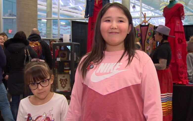 Two young girls in pink.