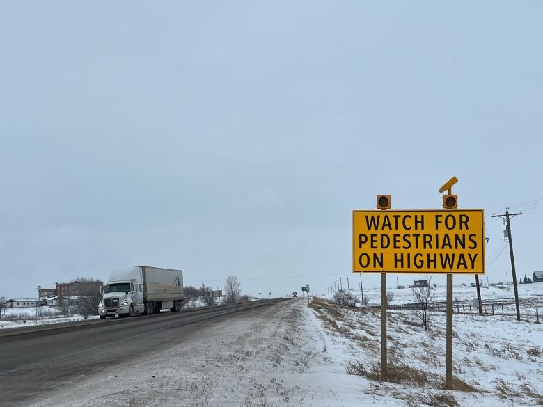 A sign along a Highway intended to alert divers to pedestrians