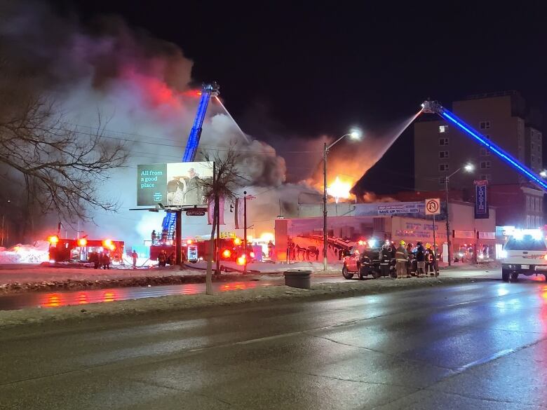 Several fire trucks respond to an emergency call.