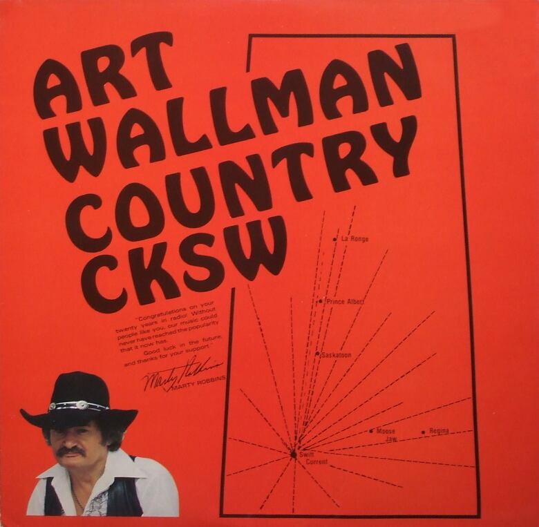 Red album cover with large black text. A an in the cowboy hat is featured on the bottom left