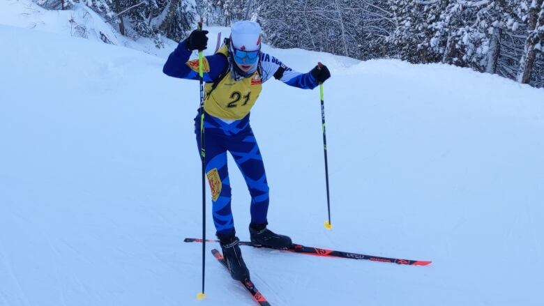 A person outside in the snow skiing.