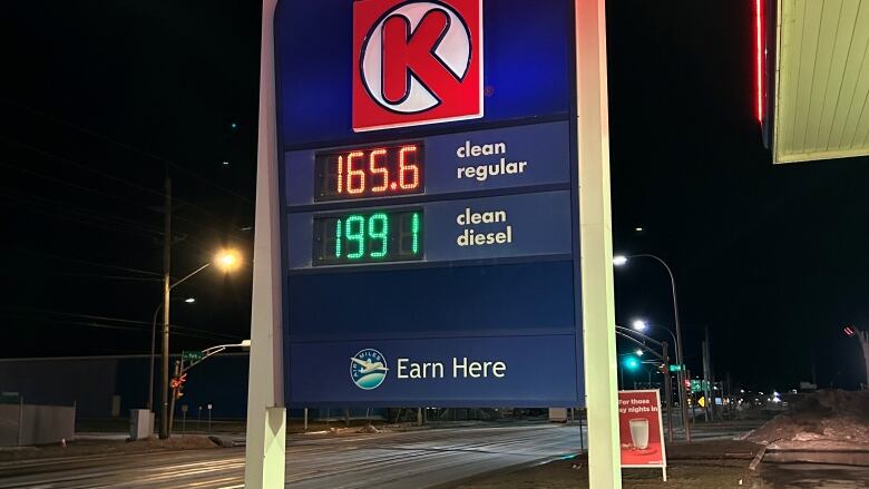 Sign showing the price of gas and diesel.