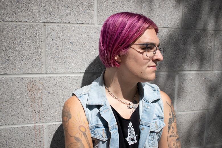 Transgender activist Cat Haines sits for her headshot. 