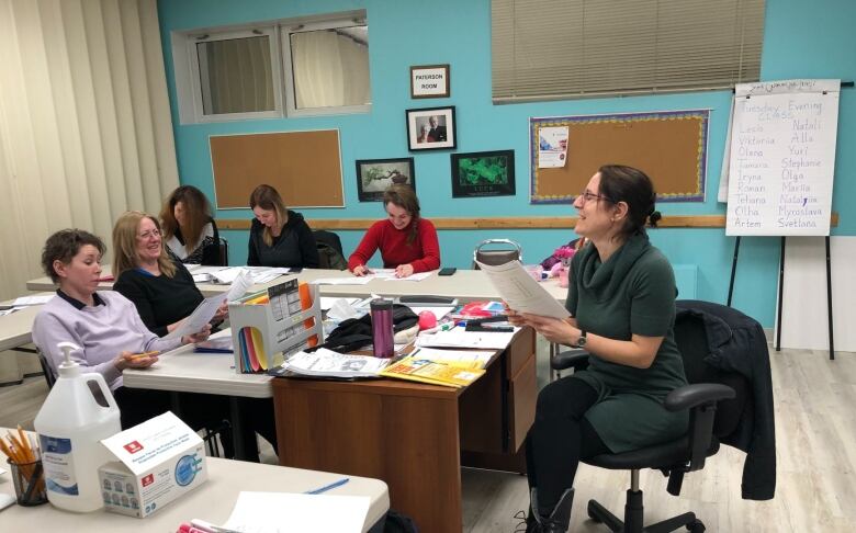 Six women sitting in a classroom.