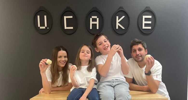 A family at a bakery.