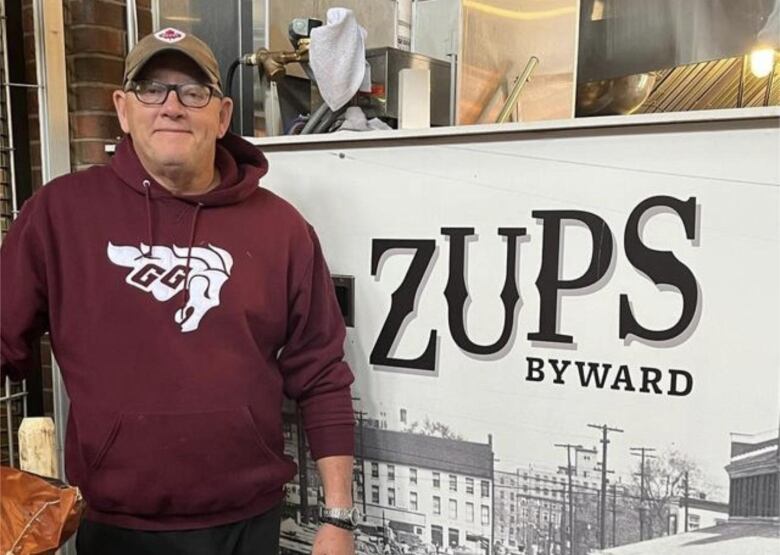 A restaurant owner in front of his ZUPS ByWard storefront. 