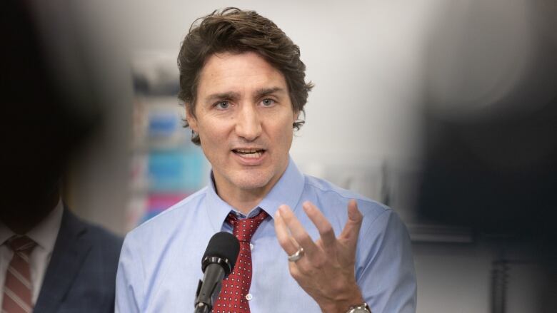 Prime Minister Justin Trudeau answers questions at a scrum with press in Halifax on Thursday, Feb. 23, 2023.