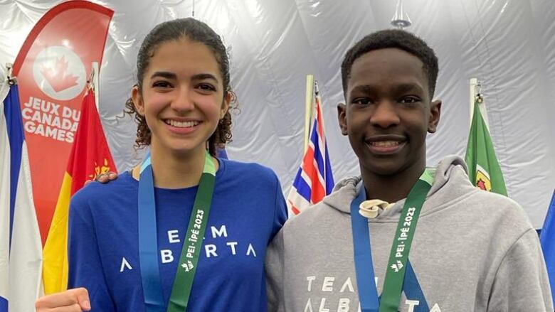 Donya Movaffag, left, and Ethan Tomusange, will be bringing home gold medals in karate from the 2023 Canada Winter Games. Movaffag won in the under-59-kilogram women's category and Tomusange won in the under-68-kilogram men's category.