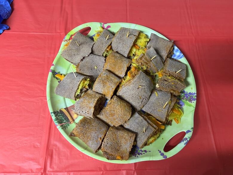 Injera, brought by one of the community home cooks.