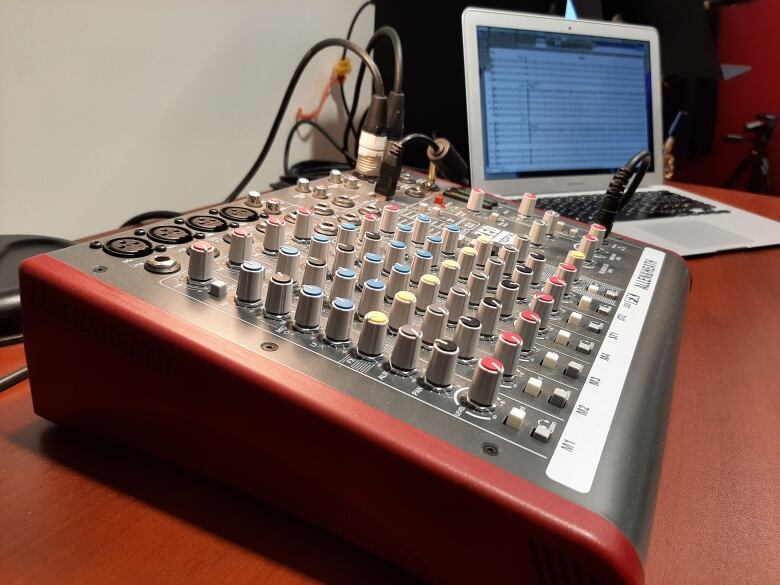 A mixing board and recording console is shown in the Greg Clark Studio, which opened last month.