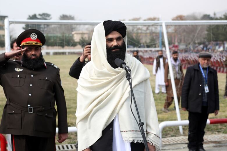 Taliban acting Interior Minister Sirajuddin Haqqani speaks during a graduation ceremony at the police academy in Kabul, Afghanistan, Saturday, March 5, 2022.