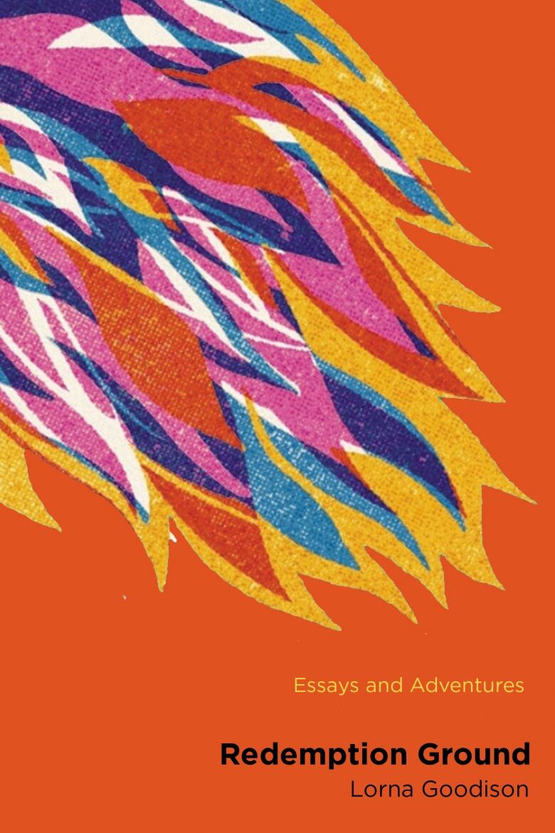 The red book cover features a multicoloured illustration of a bird's wing. 