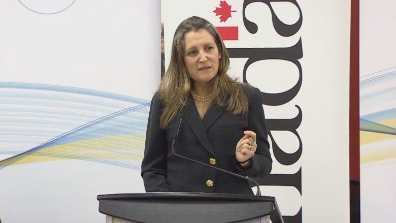 Deputy Prime Minister Chrystia Freeland at podium