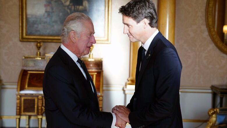 King Charles and Prime Minister Justin Trudeau are pictured at Buckingham Palace in London. 