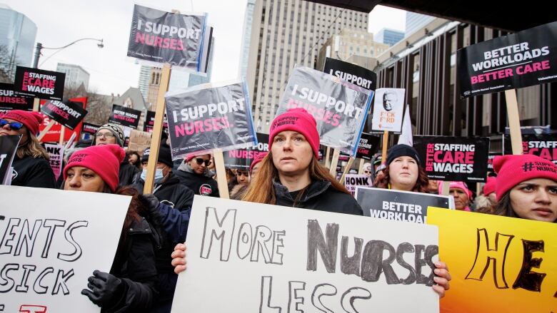 Members of the Ontario Nurses' Association hold a rally outside the Sheraton hotel, in downtown Toronto, on March 2, 2023.