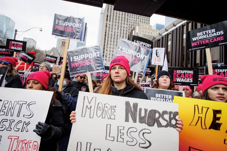 Members of the Ontario Nurses' Association hold a rally outside the Sheraton hotel, in downtown Toronto, on March 2, 2023.