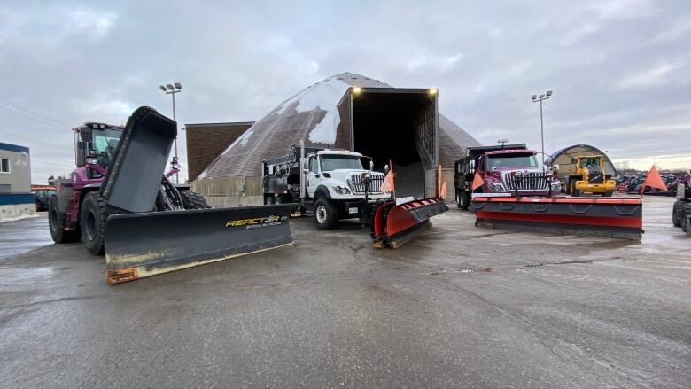 Snow clearing vehicles are pictured.