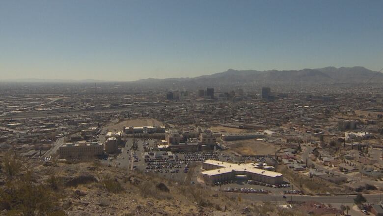 An aerial view of a city landscape in the desert.