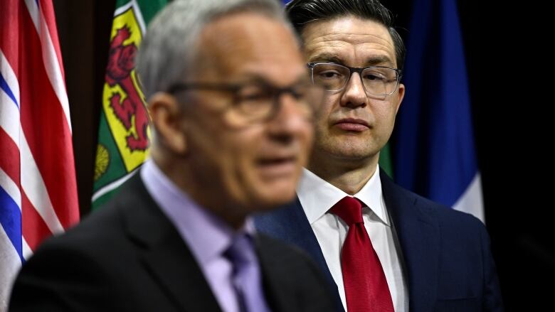 Conservative Leader Pierre Poilievre and Tory MP Ed Fast are pictured at a press conference on Parliament Hill.