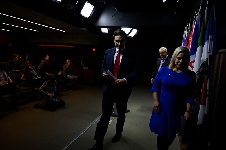 Conservative Leader Pierre Poilievre is pictured leaving a news conference on Parliament Hill.