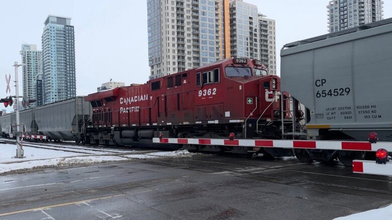 A CP freight train runs through downtown Calgary.