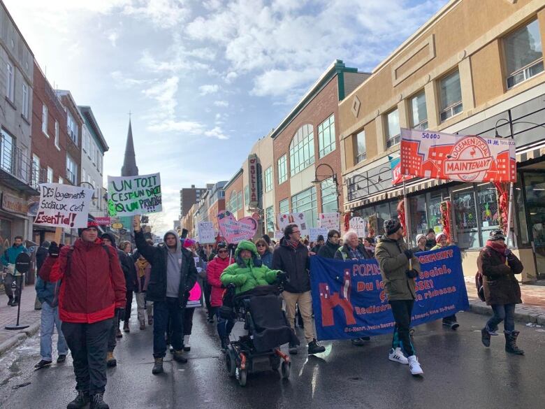 People are marching in the street.