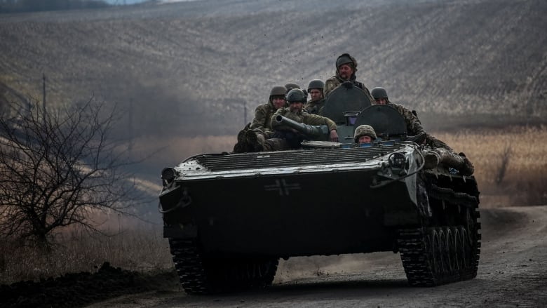 Ukrainian soldiers are seen on the move near the city of Bakhmut.