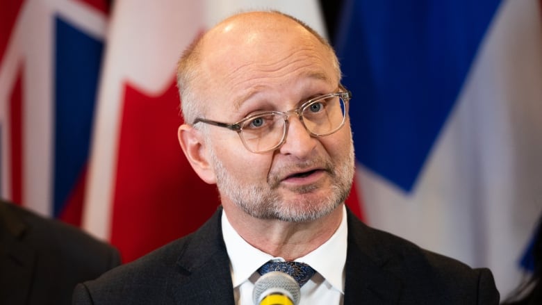 Justice Minister David Lametti is pictured at a news conference.