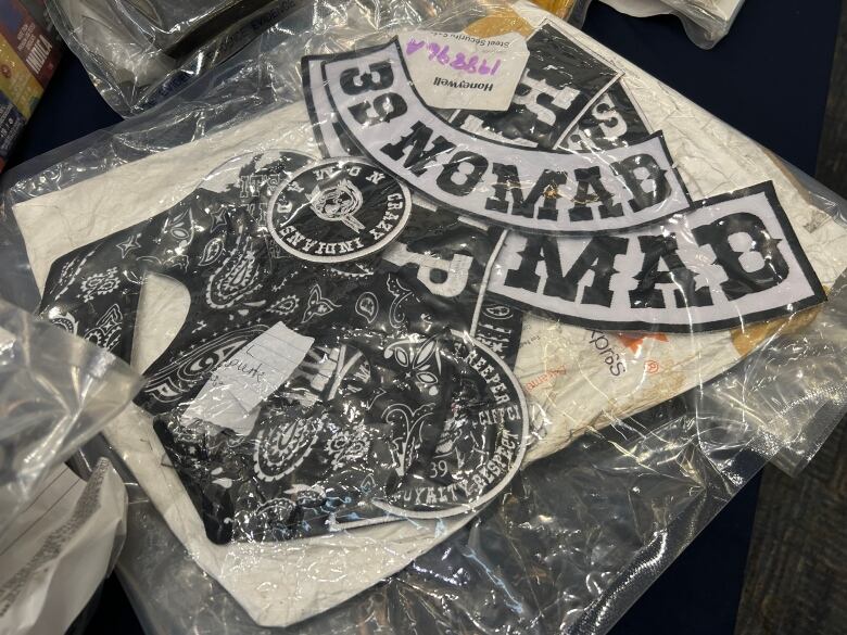 Gang-related patches are displayed by RCMP as part of the Project Dawgpound bust.