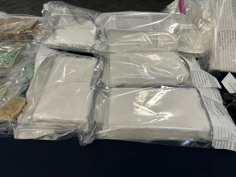 Bags of cocaine are displayed by RCMP as part of the Project Dawgpound bust.