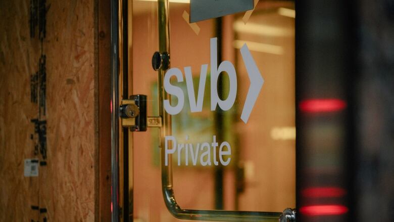 A Silicon Valley Bank branch office glass door and logo