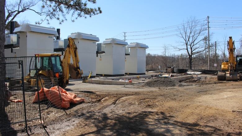 A construction zone, with four generator structures.