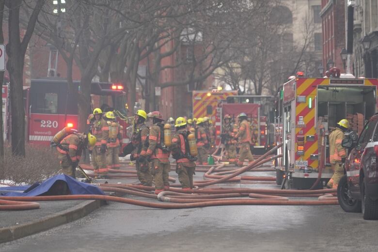 There are a large group of firefighters.