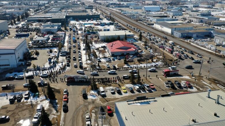 An aerial photo of a street procession.