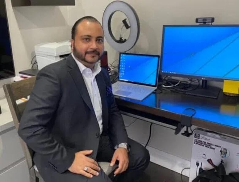 Cybersecurity analyst Ritesh Kotak in his Toronto home office.