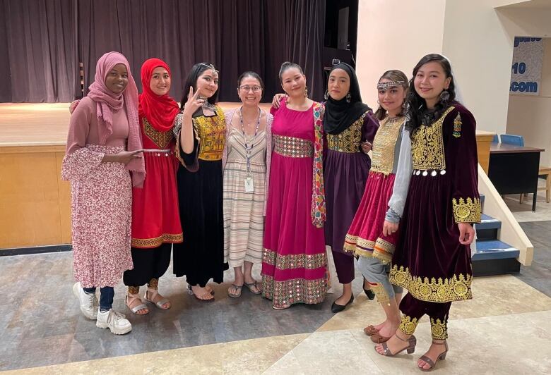 Banin Arjmand poses with fellow students from Afghanistan in traditional dress. 