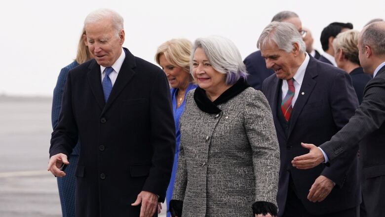 A crowd of politicians and dignitaries. 