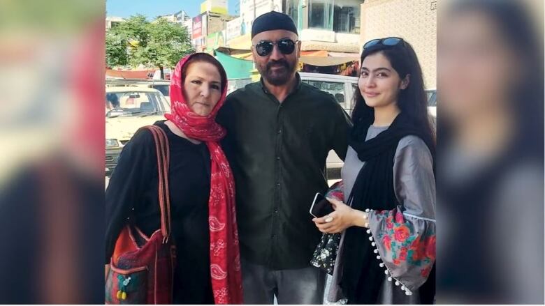 Farhang Nesar and her parents before the Taliban seized power in Afghanistan.