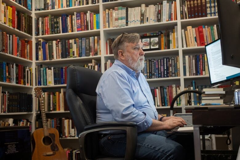 Pastor Doug Wilson of Christ Church works in his office, in Moscow, Idaho, U.S., June, 8 2022. Picture taken June, 8 2022. REUTERS/Matt Mills McKnight