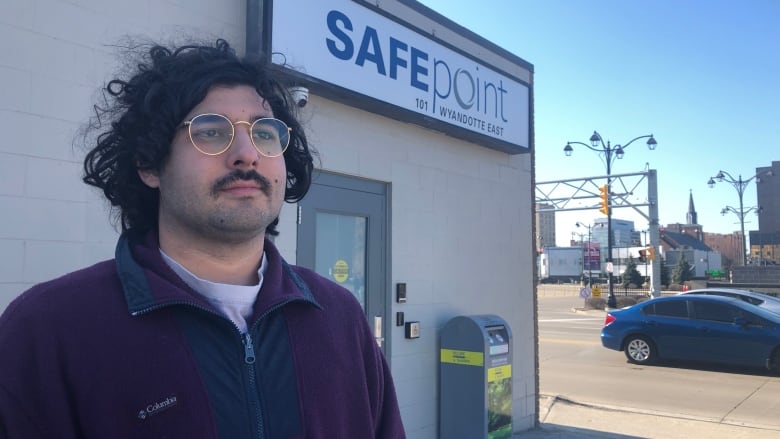 Bilal Nasser of the Save the Windsor CTS group stands outside the Safepoint Consumption and Treatment Site.